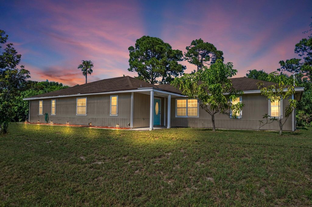 Photo of 5600 Raintree Trail, Fort Pierce, FL 34982 (MLS # R10997481)