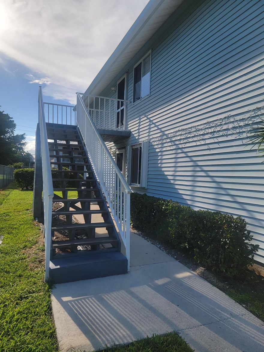 Lovely 3-bedroom, 2-bath second floor condo  with carport that is only a few steps away located in the desirable and well maintained community of The Fountains of St Lucie located in the heart of Port St Lucie. Spacious open floor plan with tile throughout, new interior paint, balcony for relaxing and enjoying beautiful sunsets and breezy evenings. The primary suite offers private bath and ample closet space. Located close to shopping, restaurants, schools, shopping and beaches!  Come check it out for yourself!