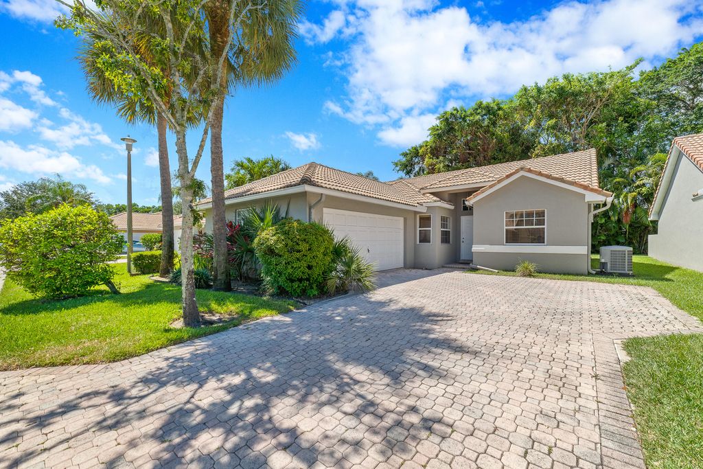 Photo of 5397 Grande Palm Circle Cir, Delray Beach, FL 33484 (MLS # R10813015)