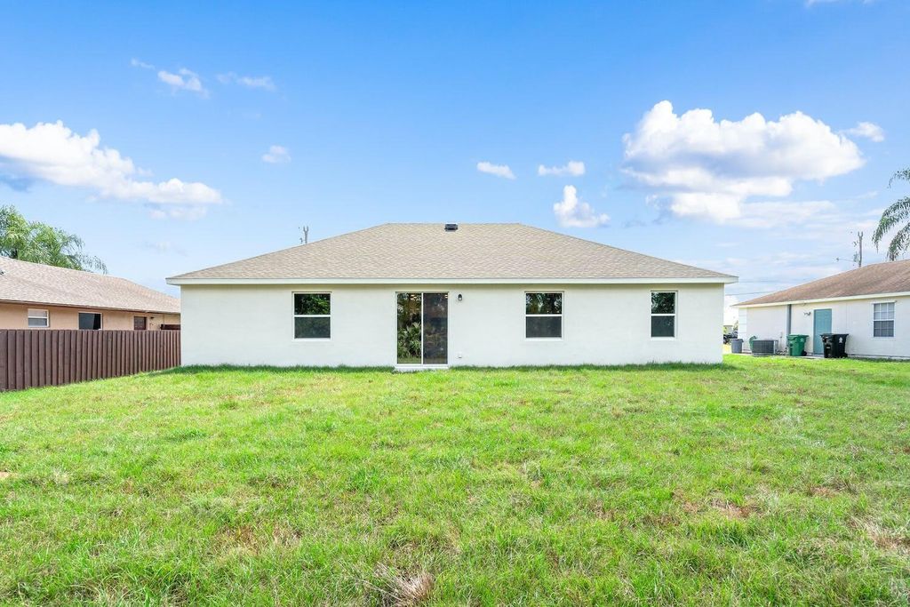 Photo of 4525 SW Calloway Street, Port Saint Lucie, FL 34953 (MLS # R10976258)