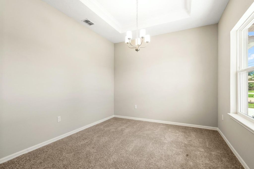 Photo of 4525 SW Calloway Street, Port Saint Lucie, FL 34953 (MLS # R10976258)