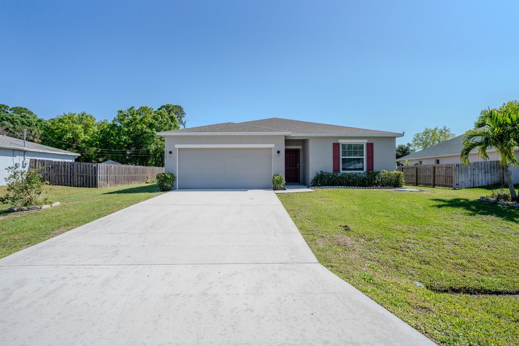 Photo of 1925 SW Cycle Street, Port Saint Lucie, FL 34953 (MLS # R10962216)