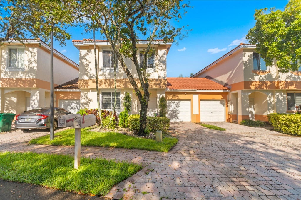 Photo of 6633 Hidden Cove Drive #5-7, Davie, FL 33314 (MLS # F10458901)