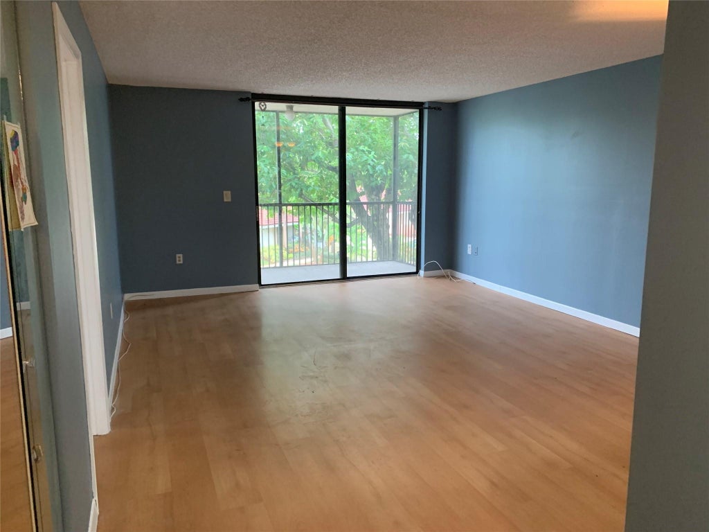 Photo of 5530 NW 44TH Street #311C, Lauderhill, FL 33319 (MLS # B26080762)