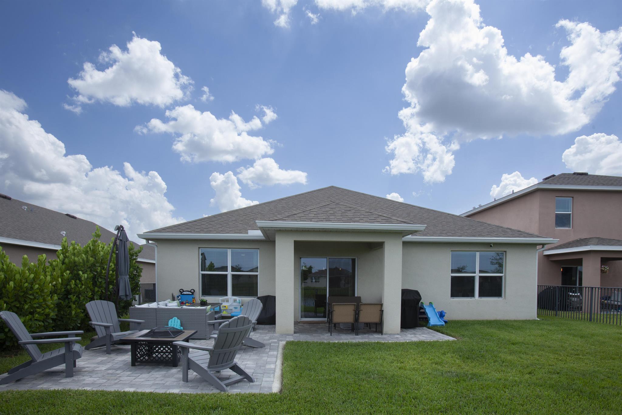This four-bedroom 2 bath 2 car garage home was built in 2021 and has been meticulously updated. It includes a smart home package, stainless steel appliances.; Energy-efficient double-pane windows, gutters, sprinklers, and well-lit sidewalks for enjoyable evening and morning walks. Crosstown Commons HOA is less than $400 a year! This includes a children's playground, and a sparkling pool. Crosstown Commons Community is an ideal choice. Nestled on the outskirts of Tradition and St. Lucie West, this location offers a quick two-minute drive to I-95, unlocking endless travel possibilities. Move in ready! Schedule your appointment today