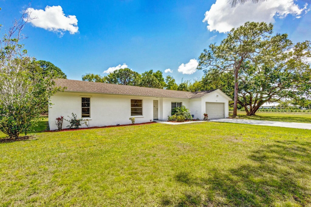 Photo of 14282 64th Drive N, Palm Beach Gardens, FL 33418 (MLS # R11075958)