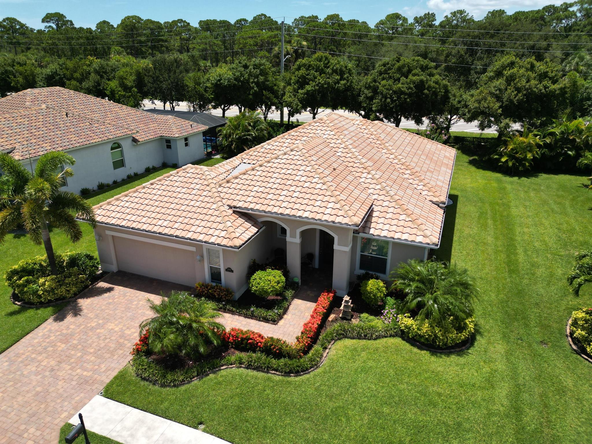 Live where others vacation! This pristine 2/2 + flex room offers a perfect blend of comfort, luxury, & convenience for anyone seeking a home in Vero Beach, Florida's perfect hideaway! Step inside- you'll find a world of features designed to please: high ceilings accented with crown molding in the main living areas & primary bedroom, a striking stone feature wall in the great room; a kitchen that's a chef's delight w/granite countertops, ss appliances + an expansive island perfect for entertaining. Proximity to beaches, shopping, plus low HOA & reasonable home insurance makes this home an unbeatable choice/value. Room size apprx sub to error