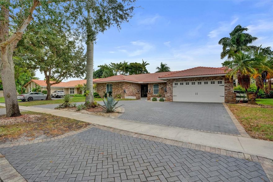 Jacaranda Lakes Beauty! Hurry on this large 4 bedroom 2.5 bath pool home! Lots of space to roam. Formal living and dining room. Updated kitchen with stainless appliances. Breakfast area! Large master bedroom with walk in closet. New master bath completely upgraded with dual sinks and shower. Main bathroom also upgraded with has dual sinks.  Ceramic tile throughout including bedrooms. No carpet! Screened patio over looking very inviting open pool are. Very private fenced backyard. Perfect for entertaining! Inside laundry room. Nicely converted garage with could be used for additional bedroom, office or playroom. Small pet ok with pet deposit. Neat and clean and ready for you! Rent includes Lawn and Pool care.