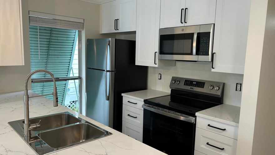 Serene water view in the gated community of Cypress Point in PGA National. This is a very desirable TWO bedroom unit! Just remodeled. New kitchen cabinets with stainless steel appliances. New water heater, bathroom cabinets, laminate flooring, and paint. Lake view covered balcony to enjoy the breeze and watch the nature and water views. Community has a nice pool, a walking path going through PGA National, and a park near by. Centrally located in Palm Beach Gardens, close to the Turnpike and I95. Water included.