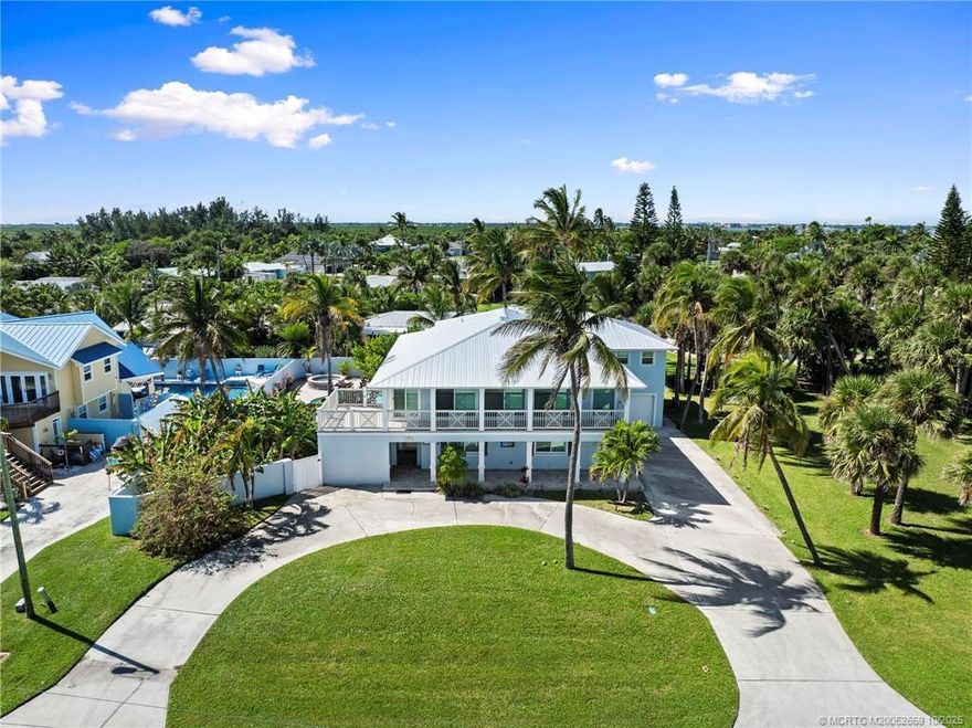 Discover this spectacular, ocean view, multi-generational home on Hutchinson Island with private beach, totally rebuilt 2010-2017. New metal roof in 2024. Pool & in-ground spa. Beautifully furnished. Guest area on ground floor with 2 beds, 1 bath, kitchenette & living room. Upstairs with ocean view, wood floors, great kitchen including stainless appliances with wall oven, cook-top, wrap-around bar, & two sinks. Living room conversation area, & outside wrap-around balcony. Huge main bedroom with oversized walk-in closet, bath with marble floors, shower & tub with jets. Only 5 minutes to Fort Pierce Inlet South. Great house for entertaining.