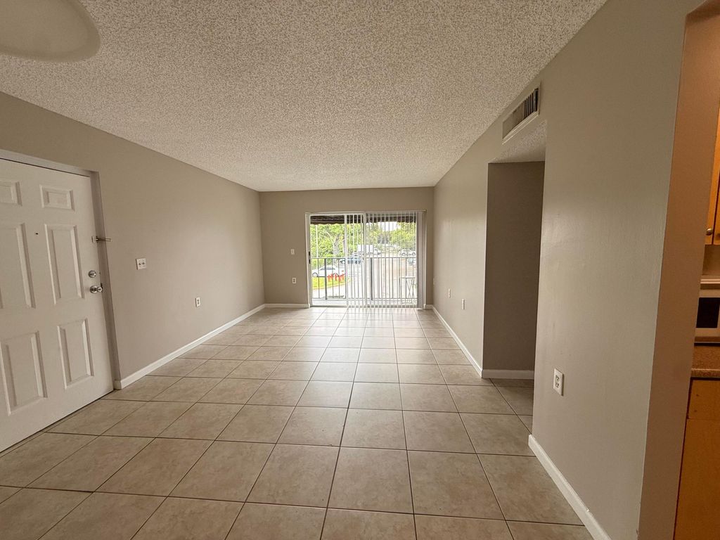 Photo of 1139 Lake Terry Drive #M, West Palm Beach, FL 33411 (MLS # B26020537)