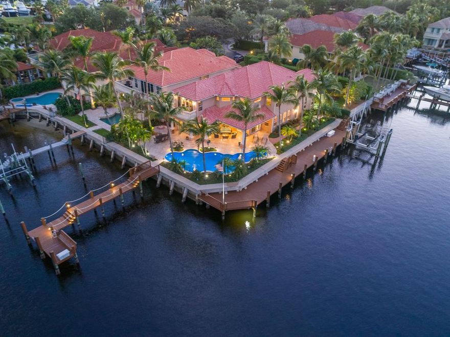 INTRACOASTAL POINT ESTATE WITH 250' OF WATERFRONT!!-LOCATED IN THE GATED COMMUNITY PROSPERITY HARBOR.MAGNIFICENT WATERVIEWS, DOCKAGE FOR YACHT INCLUDES 50,000 LBS BOAT LIFT! GORGEOUS POOL AND OUTDOOR AREA, TRAVERTINE POOL DECK, SUMMER KITCHEN ENTERTAINING IS A PLEASURE!! GORGEOUS DOWNSVIEW KITCHEN WITH SUBZERO AND MIELE APPLIANCES,SUBZ WINE STORAGE TOO!LIMESTONE COUNTERS, CUSTOM CABINETRY, SNACK BAR, OPEN WATERVIEWS. WATCH THE BOATS GO BY! GORGEOUS EAST EXPOSURE, MASTER SUITE WITH TERRACE OVERLOOKING THE WATER,SITTING ROOM AND LUXURIOUS MARBLE BATH, SEPARATE TUB AND SHOWER, BIDET, LOCATED MINUTES TO PALM BEACH INLET, BEAUTIFUL DINING ROOM, LIVING ROOM, INTIMATE FIREPLACE, ARTWORK LIGHTING, STONE FLOORING, BEAUTIFUL OFFICE OR MEDIA ROOM, THIS IS WHAT YOU LOVE....THE WATER