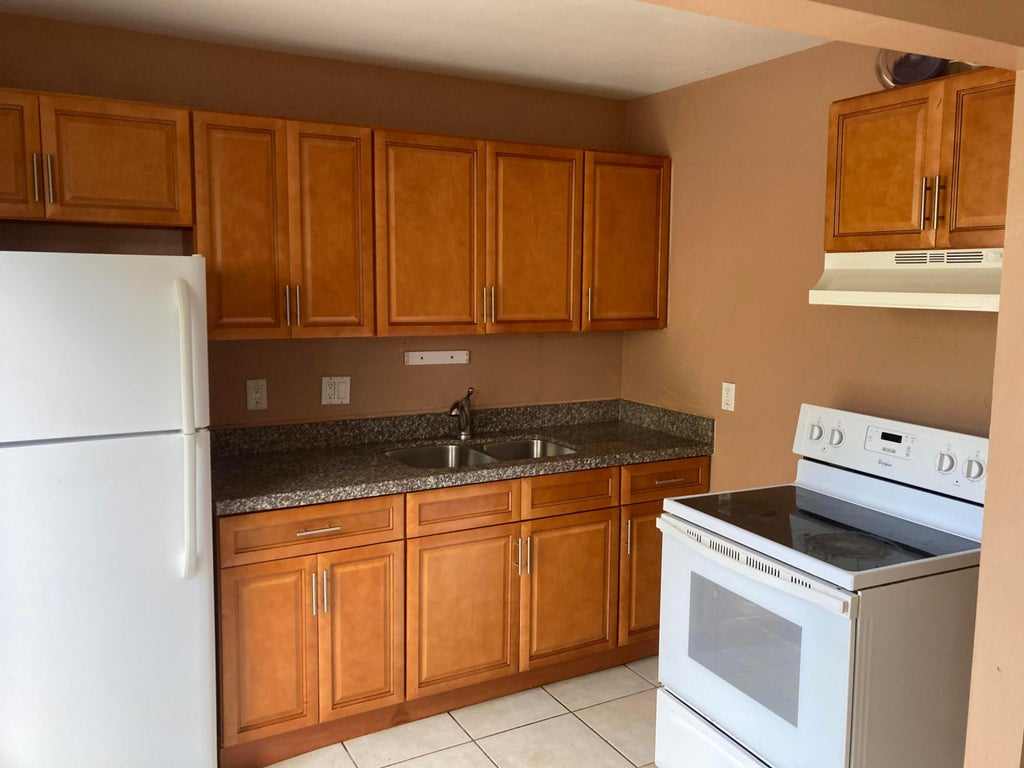 Photo of 4715 NW 9TH Drive #4715, Plantation, FL 33317 (MLS # B26071489)