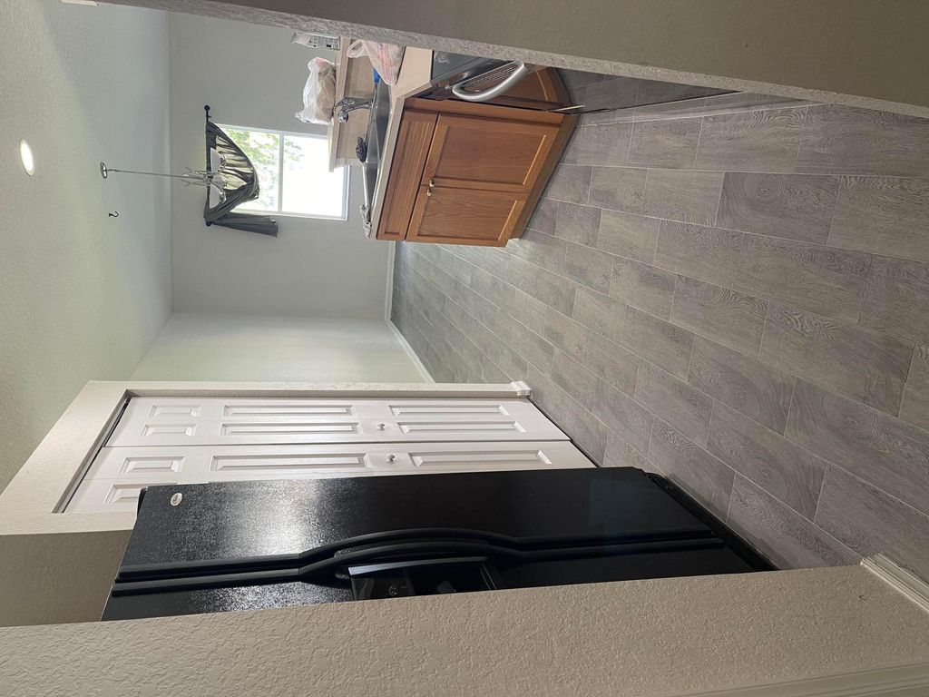 Photo of 5094 Rambler Rose Way, West Palm Beach, FL 33415 (MLS # B26000767)