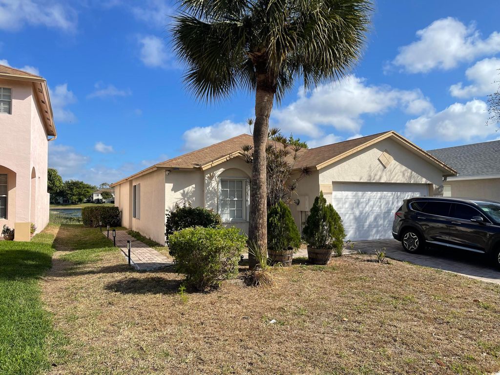 Photo of 5094 Rambler Rose Way, West Palm Beach, FL 33415 (MLS # B26000767)