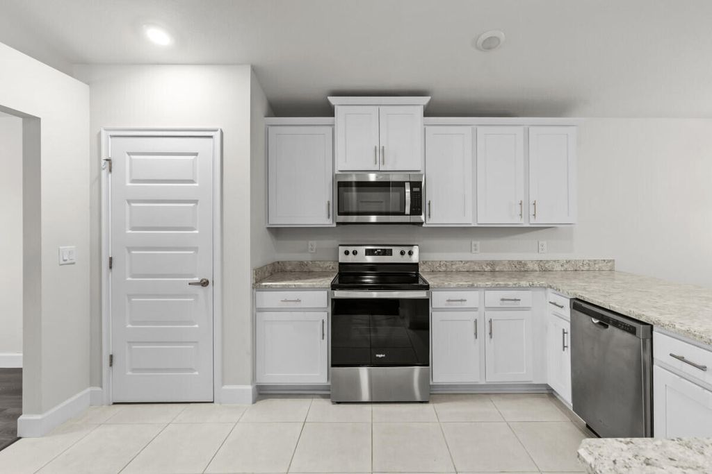 Photo of 886 NE Whistling Duck Way, Port Saint Lucie, FL 34983 (MLS # R11138914)