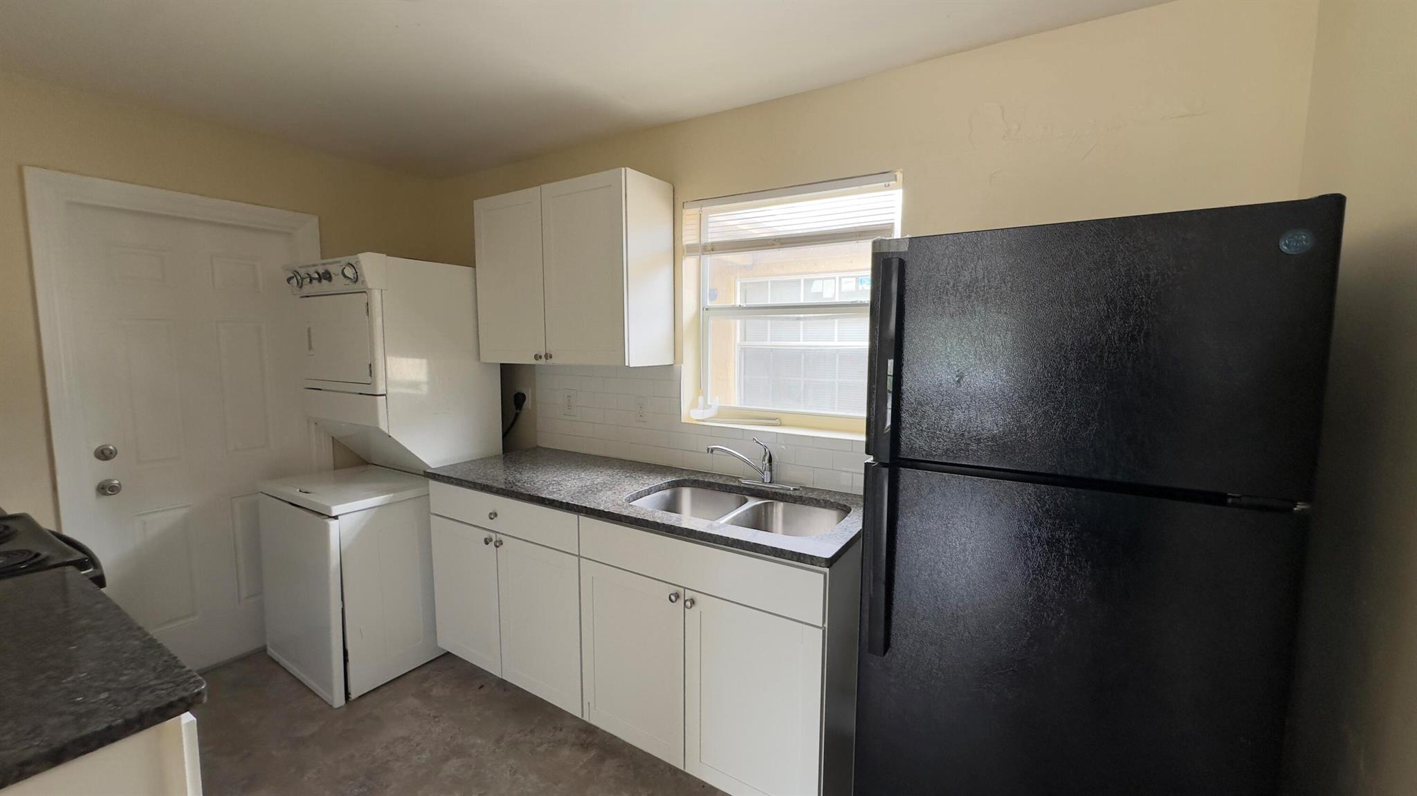 CONVENIENTLY LOCATED UPDATED TWO BEDROOM ONE BATH UNIT WITH 784 SQ FT. VINYL FLOORING THROUGHOUT. KITCHEN WITH GRANITE COUNTERTOPS. STACKABLE WASHER / DRYER. NO PETS.