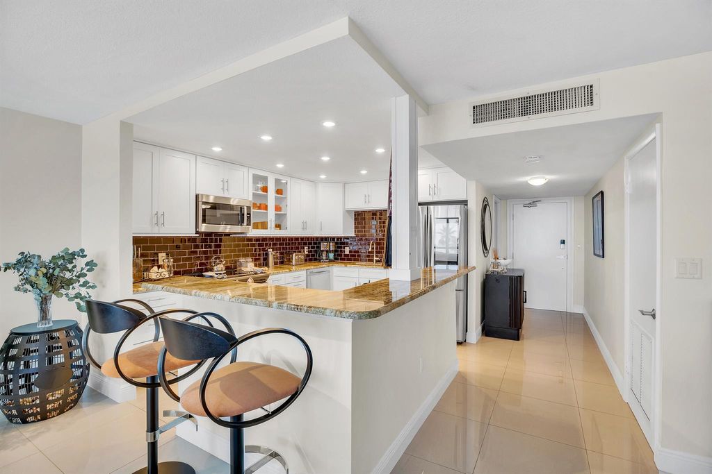 Photo of 10410 S Ocean Drive #206, Jensen Beach, FL 34957 (MLS # R11007420)