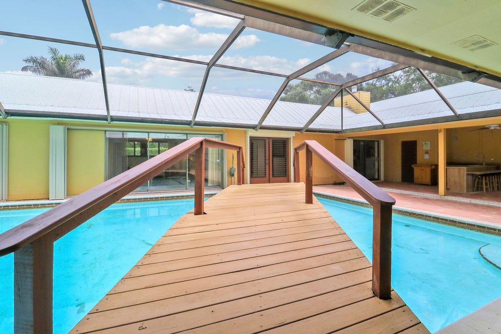 Photo of 3459 SW WOODCREEK Trail, Palm City, FL 34990 (MLS # B26073948)