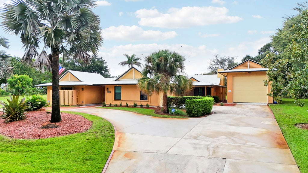 Photo of 3459 SW WOODCREEK Trail, Palm City, FL 34990 (MLS # B26073948)