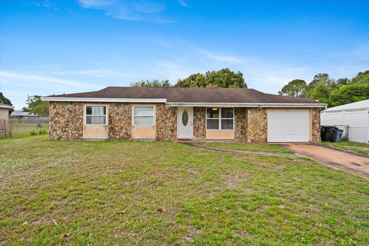 Amazing Opportunity!This 3-bedroom, 2-bath home is a fantastic option for investors, flippers, buy-and-hold strategies, and a first time home buyer. With a 2023 AC unit, 2019 water heater, and an extra-large backyard featuring mango, avocado, and tamarind trees. This property is full of potential. With some updates, this home could deliver a strong return on investment in the market. The great location make this an ideal income-producing property with great potential.Schedule your showing today!