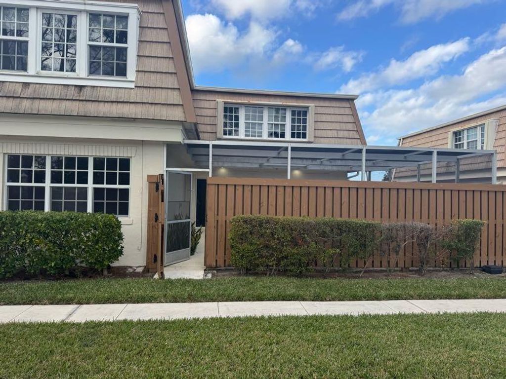 Photo of 4376 Hazel Avenue #A, Palm Beach Gardens, FL 33410 (MLS # R11051417)