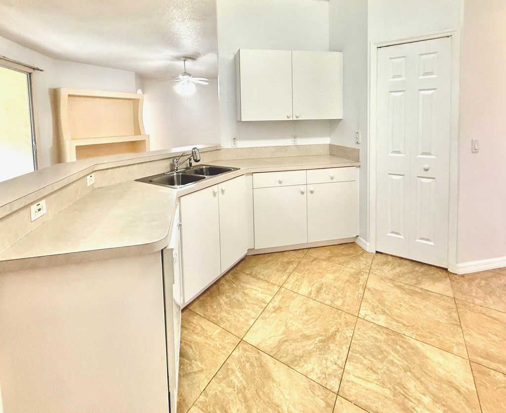 Photo of 332 SW Glenwood Drive, Port Saint Lucie, FL 34984 (MLS # B26033941)