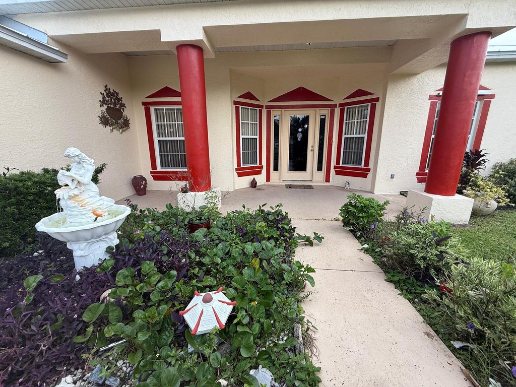 Photo of 332 SW Glenwood Drive, Port Saint Lucie, FL 34984 (MLS # B26033941)