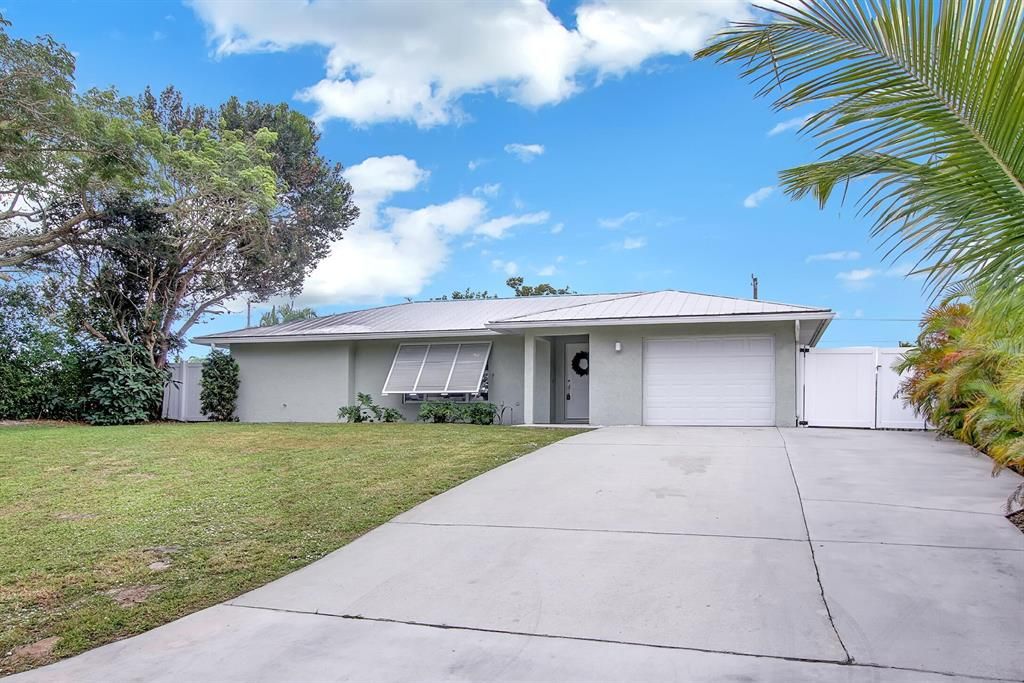 Photo of 5080 SE Pine Ridge Way, Stuart, FL 34997 (MLS # R10763847)