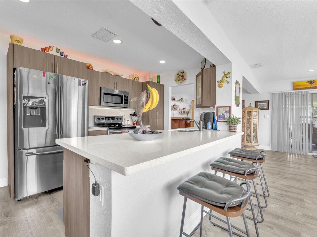 Photo of 4331 NW 12th Terrace, Deerfield Beach, FL 33064 (MLS # F10507303)