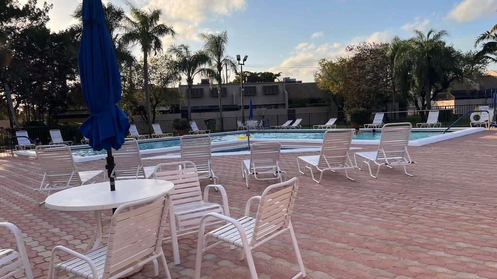 Photo of 1276 NW 122nd Ter #1276, Pembroke Pines, FL 33026 (MLS # F10417656)