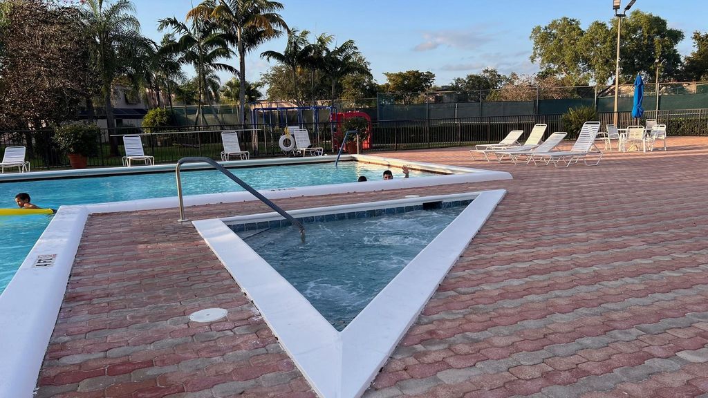 Photo of 1276 NW 122nd Ter #1276, Pembroke Pines, FL 33026 (MLS # F10417656)