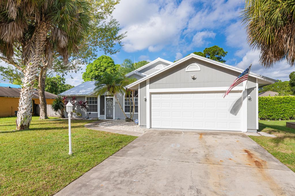 Photo of 1150 SW Irving Street, Port Saint Lucie, FL 34983 (MLS # R11023984)