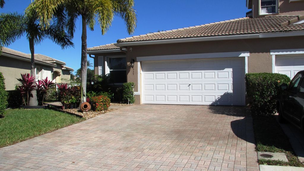 Photo of 8559 Mangrove Cay, West Palm Beach, FL 33411 (MLS # R10773860)