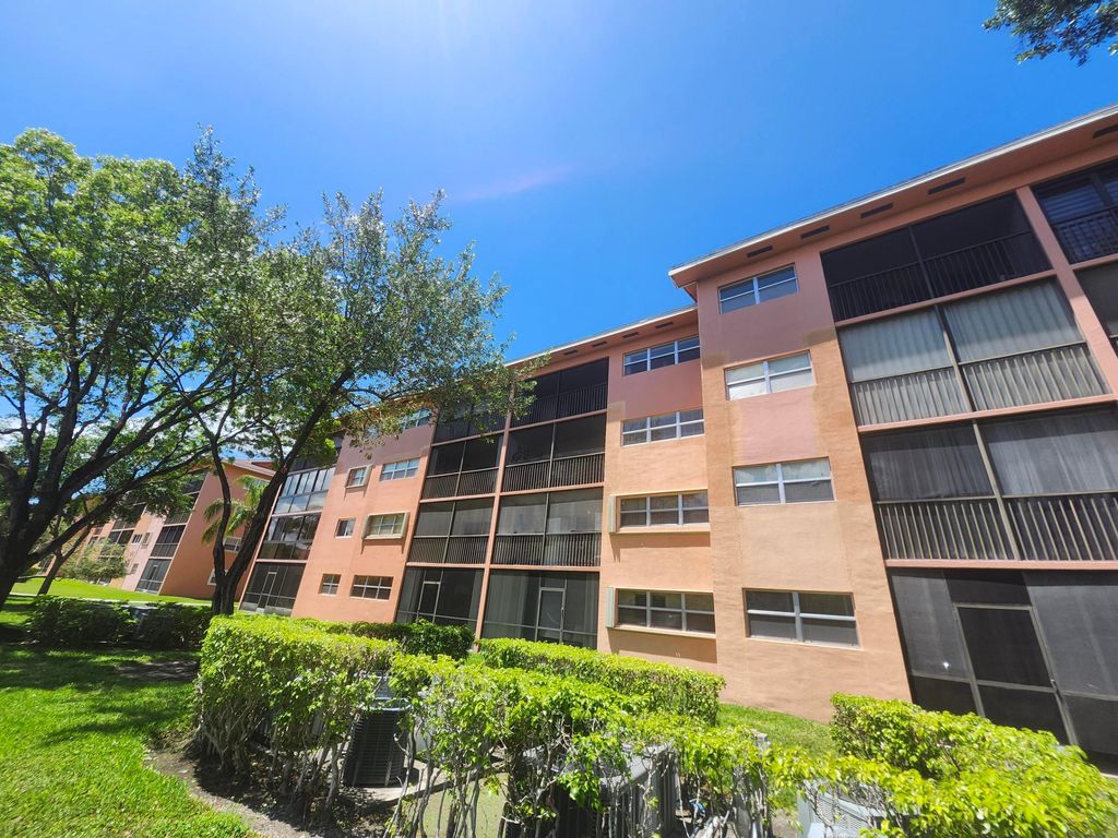 Photo of 601 SW 142nd Avenue SW #413q, Pembroke Pines, FL 33027 (MLS # B26021130)