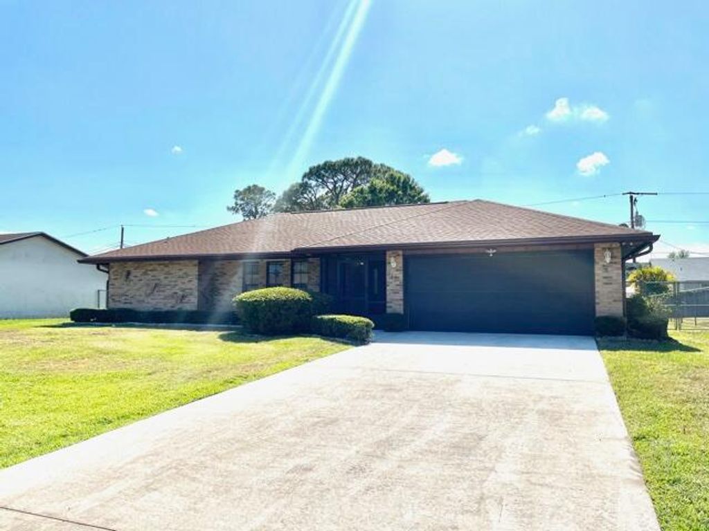 Photo of 642 SW Curtis Street St SW, Port St Lucie, FL 34983 (MLS # R10795019)