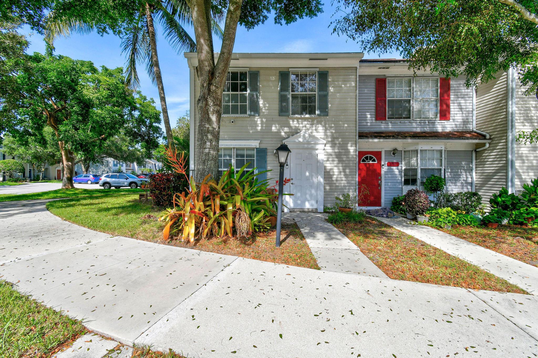 Fantastic opportunity to own a 2 bedroom, 2 bath end-unit townhome with a private fenced-in patio and views of the fountain pond. This home features a new roof (2023), complete with hurricane protection offering a solid foundation for your updates and personal touches! Located close to top-rated Jupiter schools, beautiful beaches, I-95, PBI Airport, entertainment, and dining, this property combines convenience with great potential. With its desirable end-unit location, private setting, and room to renovate, and LOW HOA fees, it's the perfect chance to create your dream home right in the Heart of Jupiter!