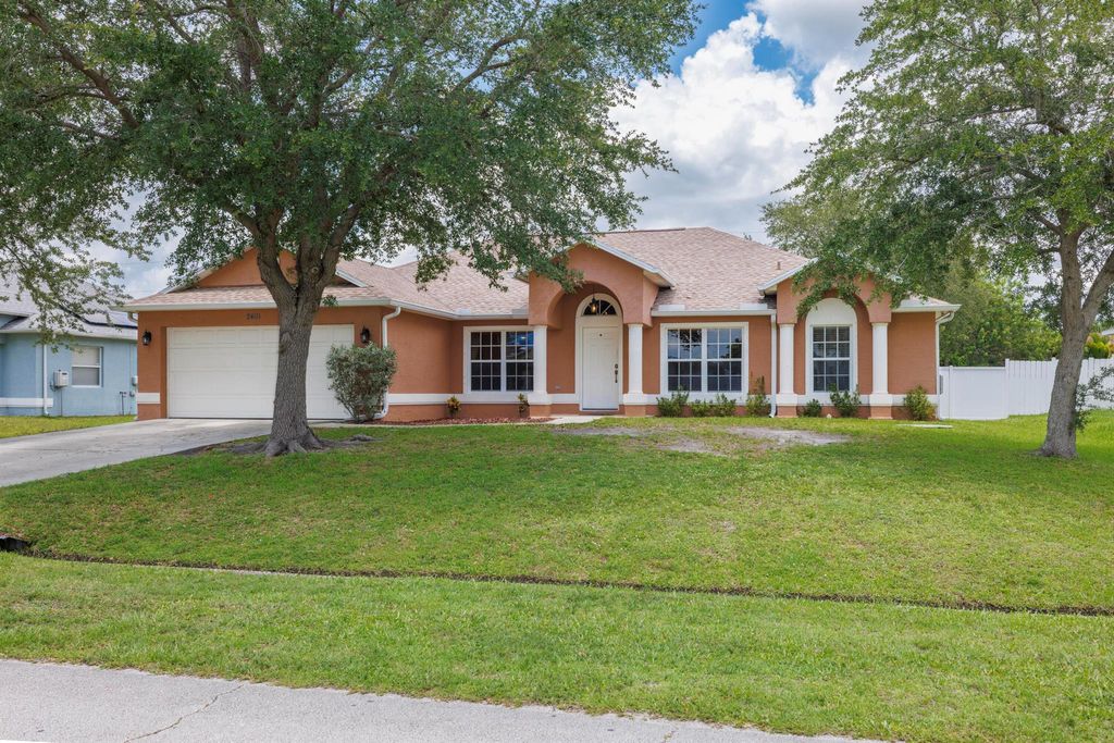 Photo of 2401 SW Santana Avenue, Port Saint Lucie, FL 34953 (MLS # R11094956)