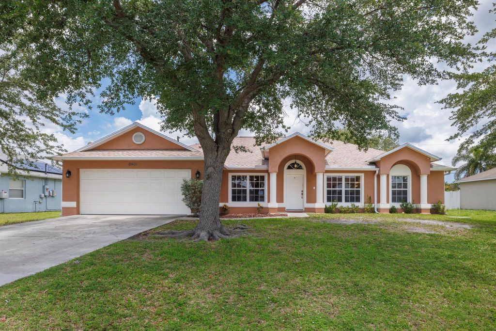 Photo of 2401 SW Santana Avenue, Port Saint Lucie, FL 34953 (MLS # R11094956)