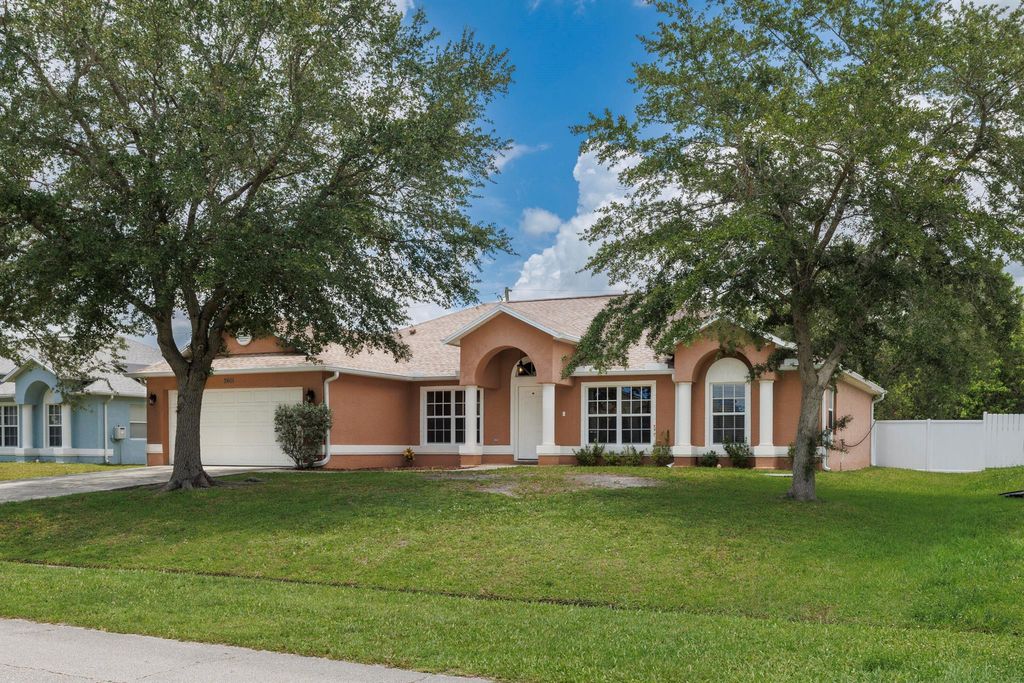 Photo of 2401 SW Santana Avenue, Port Saint Lucie, FL 34953 (MLS # R11094956)
