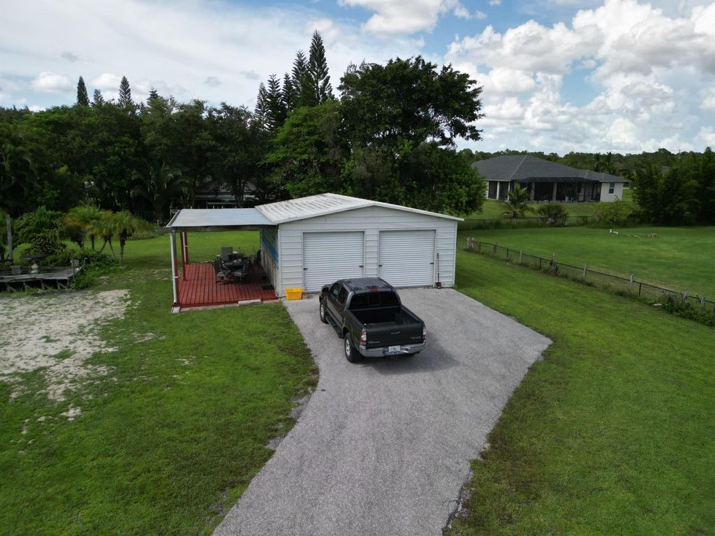 Photo of 18467 90th Street N, The Acreage, FL 33470 (MLS # R11009484)