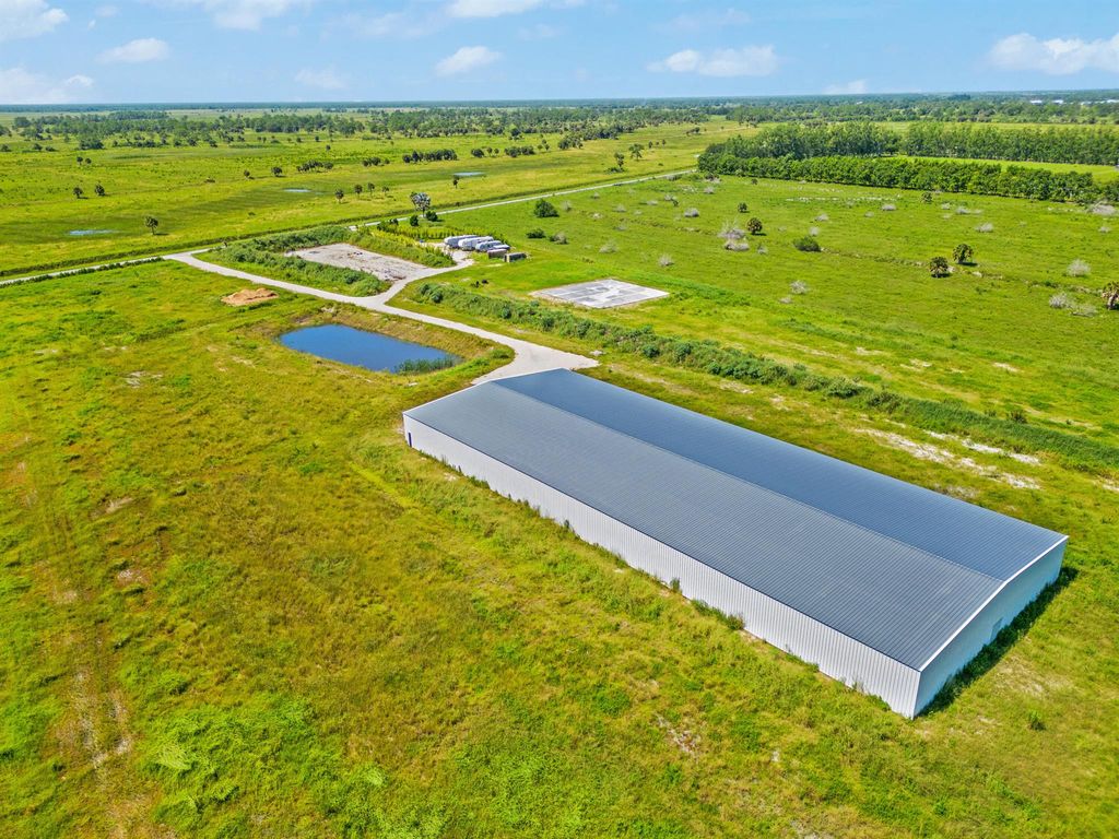 Photo of 7501 SW Groveview Terrace, Indiantown, FL 34956 (MLS # R11012491)