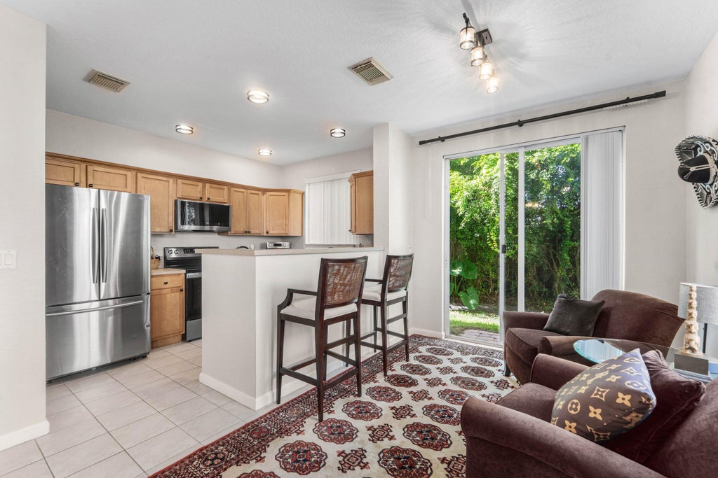 Photo of 1808 Sonrisa Street, Riviera Beach, FL 33404 (MLS # B26053516)
