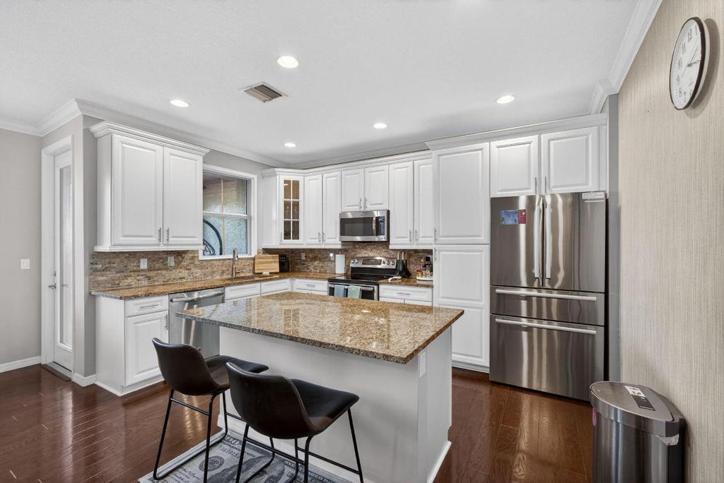 Photo of 4543 Mediterranean Circle, Palm Beach Gardens, FL 33418 (MLS # R11152152)