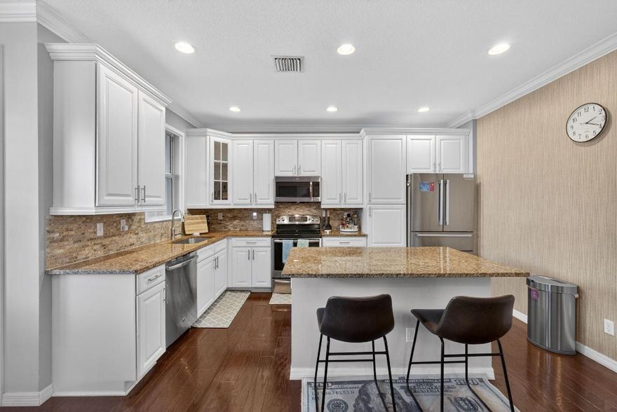 Nestled in the coveted Marsh Pointe school zone, this stunning 2014-built CBS townhouse is a true gem. Boasting 3 spacious bedrooms, 2.5 baths, and full hurricane-impact windows and doors, it seamlessly blends elegance with modern upgrades. The master suite offers a spa-like ensuite and an expansive walk-in closet, while the granite-adorned kitchen. Step outside to your private backyard oasis. Enjoy the perks of a fully gated community with a clubhouse and pool!