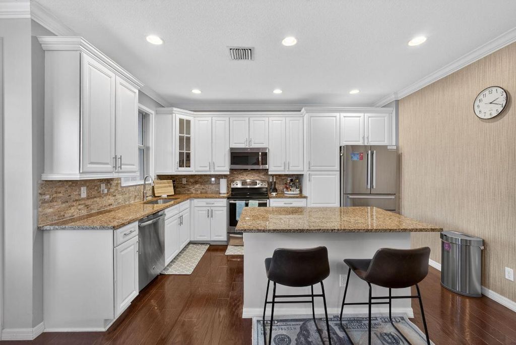 Photo of 4543 Mediterranean Circle, Palm Beach Gardens, FL 33418 (MLS # R11152152)