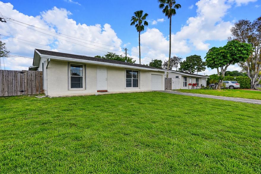 Cozy 3/2 Single-Family Updated CBS Home with a one-car garage on a corner lot with fenced-in backyard & patio! Freshly painted inside & out, plus nicely improved kitchen with beautiful countertops, slow-close cabinets, stainless steel appliances, classy lighting, tile floor and easy access to backyard. Newly sealed driveway, updated a/c system, vents, hot water heater less than one-year new, newer master bath vanity, tile shower, floor and lighting. The guest bath has a newer tub & tile shower, tile floor and lighting. The master bedroom has the same classy tile as the modern kitchen and walk-in closet. Spacious fenced in backyard with fruit trees and gathering patio. Complete accordion shutters, updated garage door and opener! Highly rated schools, close-by shopping and NO HOA!!!
