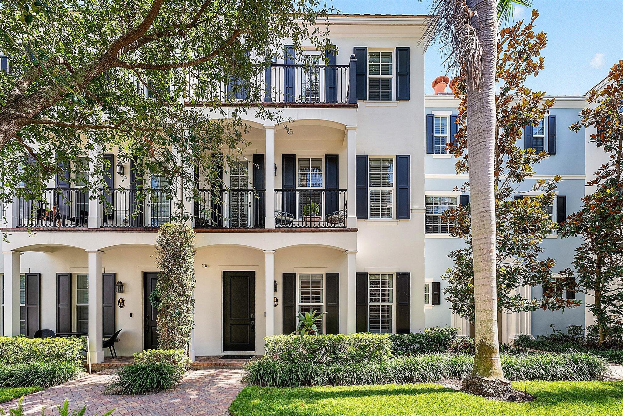 Distinctive Residence in the Heart of Historic Delray Beach. Tucked within the exclusive enclave of Cannery Row, this one-of-a-kind interior townhome occupies a southernmost position, away from the bustle of surrounding streets--offering a level of privacy and serenity rarely found in downtown Delray Beach. While other available units face busy roads, this residence is quietly set within the community's most desirable section. Just moments from Atlantic Avenue and a short ride to Delray's pristine beaches, it serves as both a private sanctuary and a gateway to the very best of South Florida living. A private elevator, with mirror and wainscoting, connects all levels of the home, Plantation shutters throughout, whole home water filtration system, central vacuum, Visual Comfort light