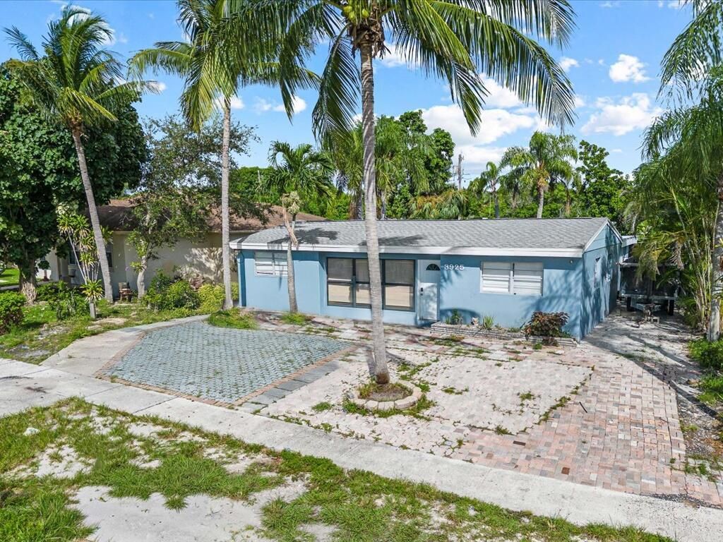 Photo of 3925 Tuskegee Drive, Lake Worth, FL 33462 (MLS # R11127462)