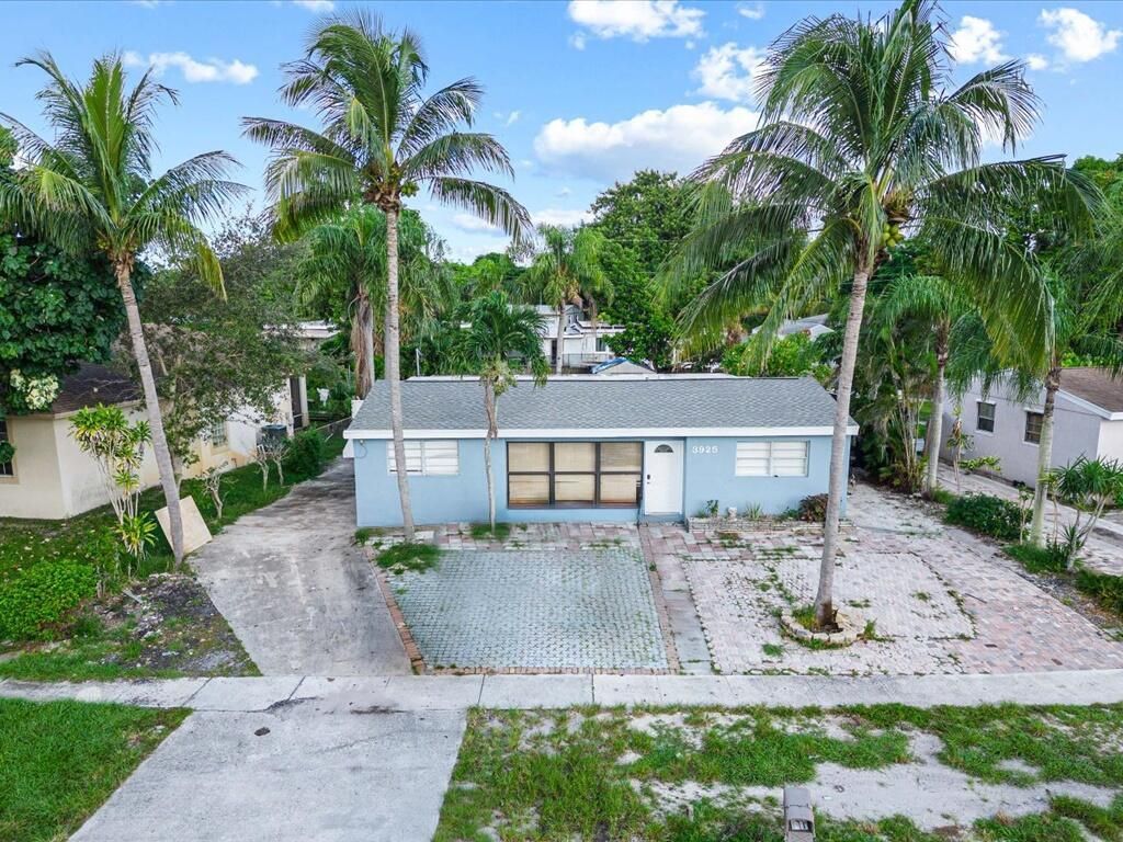 Photo of 3925 Tuskegee Drive, Lake Worth, FL 33462 (MLS # R11127462)